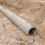 drain pipe in trench with slope