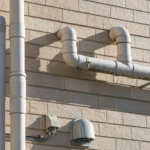 ugly exterior plumbing pipes