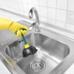 cleaning a sink drain